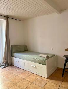 Ένα ή περισσότερα κρεβάτια σε δωμάτιο στο Mediona III