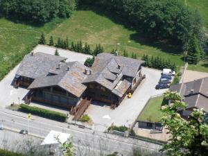 an aerial view of a large house with a yard at Apartment in Antey-Saint-André near Ski Area in Antey-Saint-André