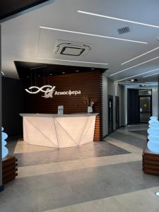 a lobby of an office with a reception desk at Аркадия ! ЖК Атмосфера ,панорама моря ,паркинг in Odesa