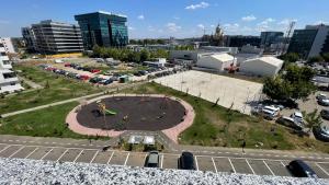 an aerial view of a park in a city at Apartament Modern Urban Space - FREE Parking in Voluntari