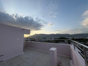 a balcony with a view of a city at Vainavi Residency in Tirupati