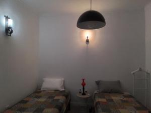 Ένα ή περισσότερα κρεβάτια σε δωμάτιο στο Casa da Avó Caia