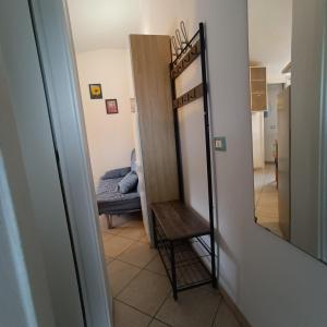 a room with a bunk bed and a mirror at Estensi 14 in Lido degli Estensi