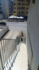 a group of benches sitting next to a building at Estensi 14 in Lido degli Estensi +3 photos
