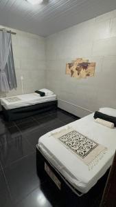 Ένα ή περισσότερα κρεβάτια σε δωμάτιο στο Casa de Inhô +18 φωτογραφίες