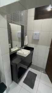 Ένα μπάνιο στο Casa de Inhô