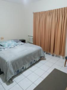 Postel nebo postele na pokoji v ubytování suite Roberto