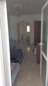 a living room with a couch and a dining room at B nadir in Tétouan