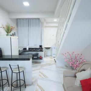Χώρος καθιστικού στο Apartamento com 2 Suites e Garagem