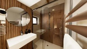 un bagno con lavandino e specchio di Villa Onyra - Cabane du midi - Appartement avec terrasse à 100m de la mer a Les Lecques