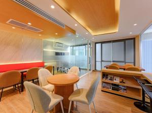 a meeting room with chairs and a table and a counter at 2BR Luxury Condo The City Phuket in Ban Ket Ho