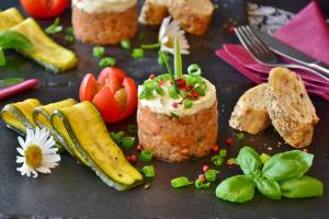 a plate with a piece of food with fruit and vegetables at Bergliesal in Wildalpen