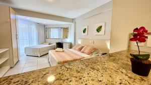 Ένα ή περισσότερα κρεβάτια σε δωμάτιο στο Marsallis Flat 301 Praia - NBI - Ponta Negra +43 φωτογραφίες