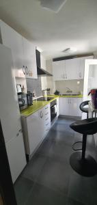 Kuchyň nebo kuchyňský kout v ubytování Habitaciones Céntricas en Vivienda Compartida + 18 fotografií