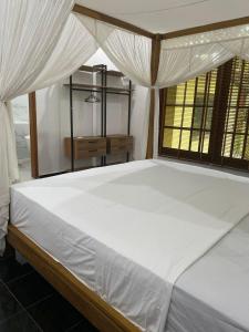 Giường trong phòng chung tại 4-Bedrooms Tropical Villa Sanur