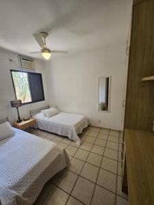 En eller flere senge i et værelse på Apto 337 super bem localizado