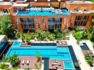 Hồ bơi trong/gần 3BR en Aldea Zama-Roof Top-2 Pool-Fast WiFi-Gym