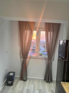 Η κουζίνα ή μικρή κουζίνα στο Sunset Horizon Apartments