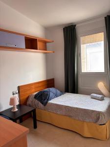 Postel nebo postele na pokoji v ubytování CASTILLEJA , Casa-Apartamento cerca centro Sevilla Wifi Familias Trabajo Garaje