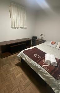 Postel nebo postele na pokoji v ubytování Suíte centro histórico