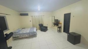 Ένα ή περισσότερα κρεβάτια σε δωμάτιο στο Casa Boaventura COP 30