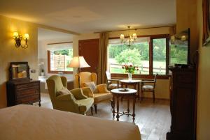 Posezení v ubytování Hotel Selba d'Ansils