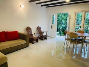 Χώρος καθιστικού στο Doranagala Holiday Cabin +11 φωτογραφίες