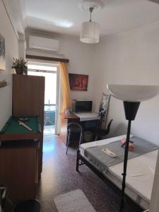 Ένα ή περισσότερα κρεβάτια σε δωμάτιο στο AB Preveza Apartments -Princess Vassiliki Downtown Swing Apartment