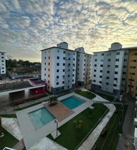 an overhead view of an apartment complex with a swimming pool at Cozy apartment-COP 30 in Ananindeua