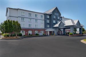an empty parking lot in front of a hotel at Spark By Hilton Orangeburg in Orangeburg