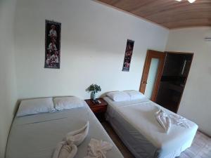 Ένα ή περισσότερα κρεβάτια σε δωμάτιο στο Hotel El Internacional +16 φωτογραφίες