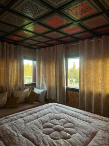 Un pat sau paturi într-o cameră la Villa à Essaouira