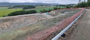 an overhead view of a train track on a hill at Sagasvingen 56 in Alta