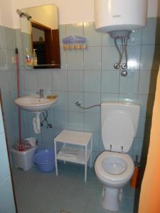 Kylpyhuone majoituspaikassa Apartments Antica
