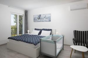 Ένα ή περισσότερα κρεβάτια σε δωμάτιο στο Villa Euphoria Mit Pool, Sauna Und Whirlpool +32 φωτογραφίες