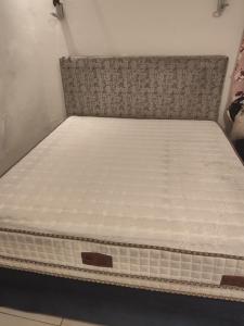a mattress on a bed frame in a room at La Mangrove Eclairée in Lope