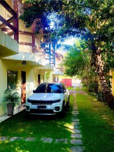 Zahrada ubytování Duplex Completo e Confortável 400mt da praia