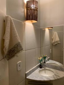 Koupelna v ubytování Duplex Completo e Confortável 400mt da praia