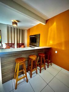 TV a/nebo společenská místnost v ubytování Duplex Completo e Confortável 400mt da praia + 37 fotografií