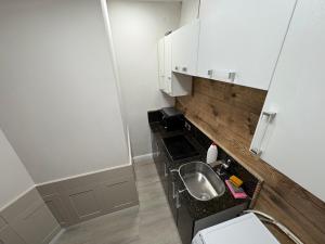 Dapur atau dapur kecil di Pokoje blisko plazy