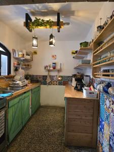 Η κουζίνα ή μικρή κουζίνα στο Casa Turquesa Diente de León