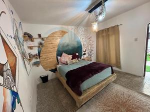 Ένα ή περισσότερα κρεβάτια σε δωμάτιο στο Casa Turquesa Diente de León