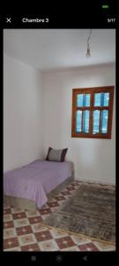 Ένα ή περισσότερα κρεβάτια σε δωμάτιο στο Family apartment