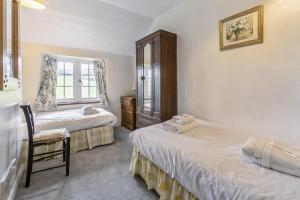 Postel nebo postele na pokoji v ubytování 2 Bed in Liskeard oc-t32876