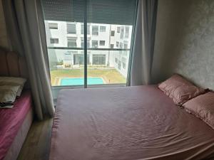 Gallery image of Appartement avec piscine à coté de l aeroport in Nouaceur