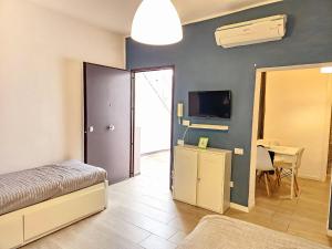 Postel nebo postele na pokoji v ubytování La Corte II