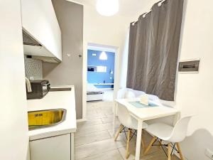 Kuchyň nebo kuchyňský kout v ubytování La Corte II