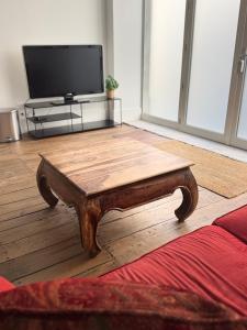 Televisyen dan/atau pusat hiburan di Argence logement T2