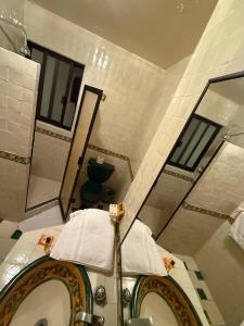 Ένα μπάνιο στο Casa La Cañada216 con Alberca Climatizada