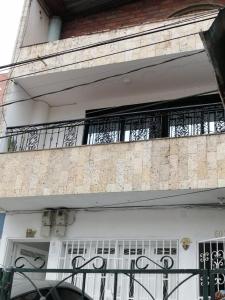 Balkón nebo terasa v ubytování Habitación acogedora en ambiente familiar al norte de Medellín + 1 fotografie